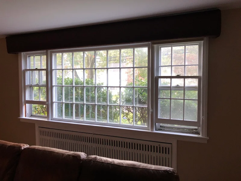 Huge single paned window which allows cold air in the room